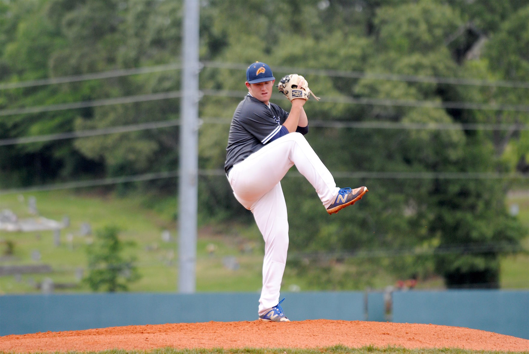 Ex-Patriot White pitches Toppers to win